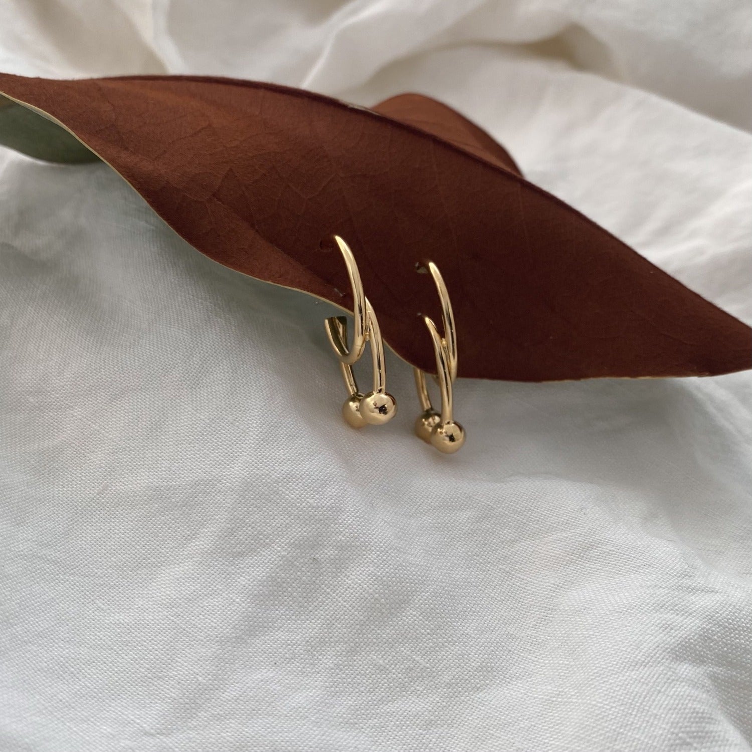 Double Barbell Earrings in Gold