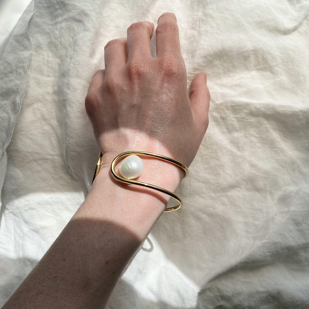 Pearl Swerve Cuff in Gold